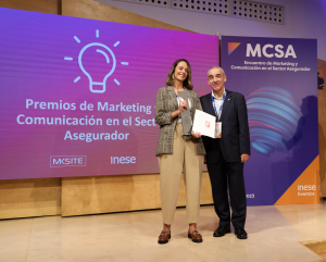 Entrega premio a Ucoga